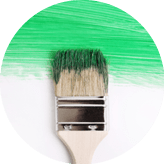 Renovation. Brush with green paint